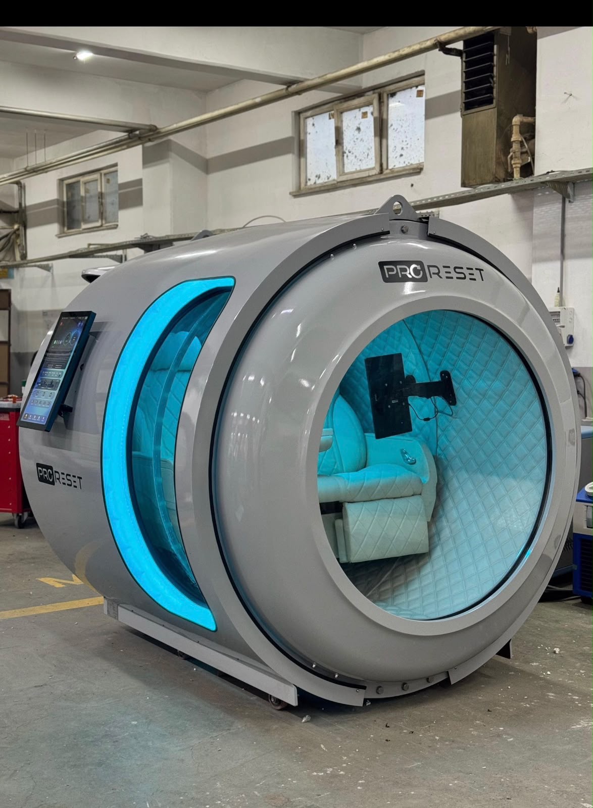 A Pro Reset hyperbaric oxygen chamber with its door open